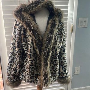 Faux fur animal print coat. Fully lined.